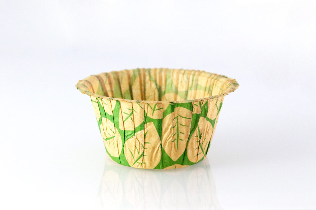 beige and green muffin cup designed with leaves